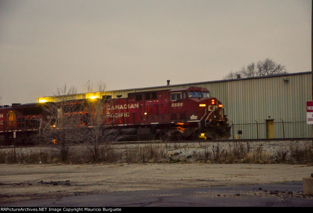 CP AC44CW Locomotive leading a train